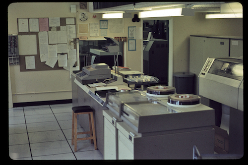 Disc drives attached to the 4130 systems in the early 1970s with the main line printer on the right.