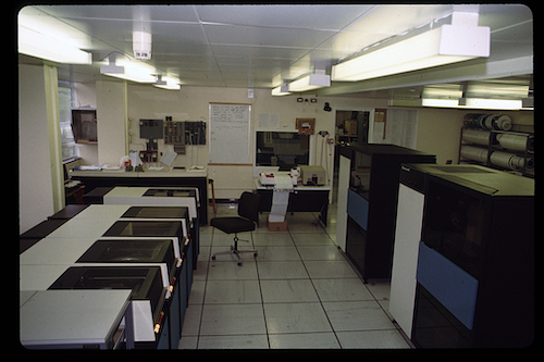 The Honeywell 6080 disc drives (left) and printers in the original Computer Room