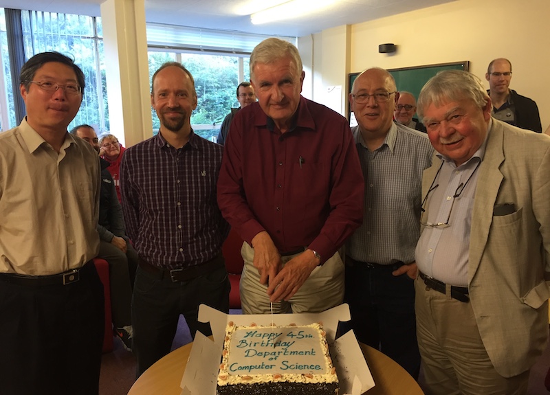 Heads of Department cutting the cake